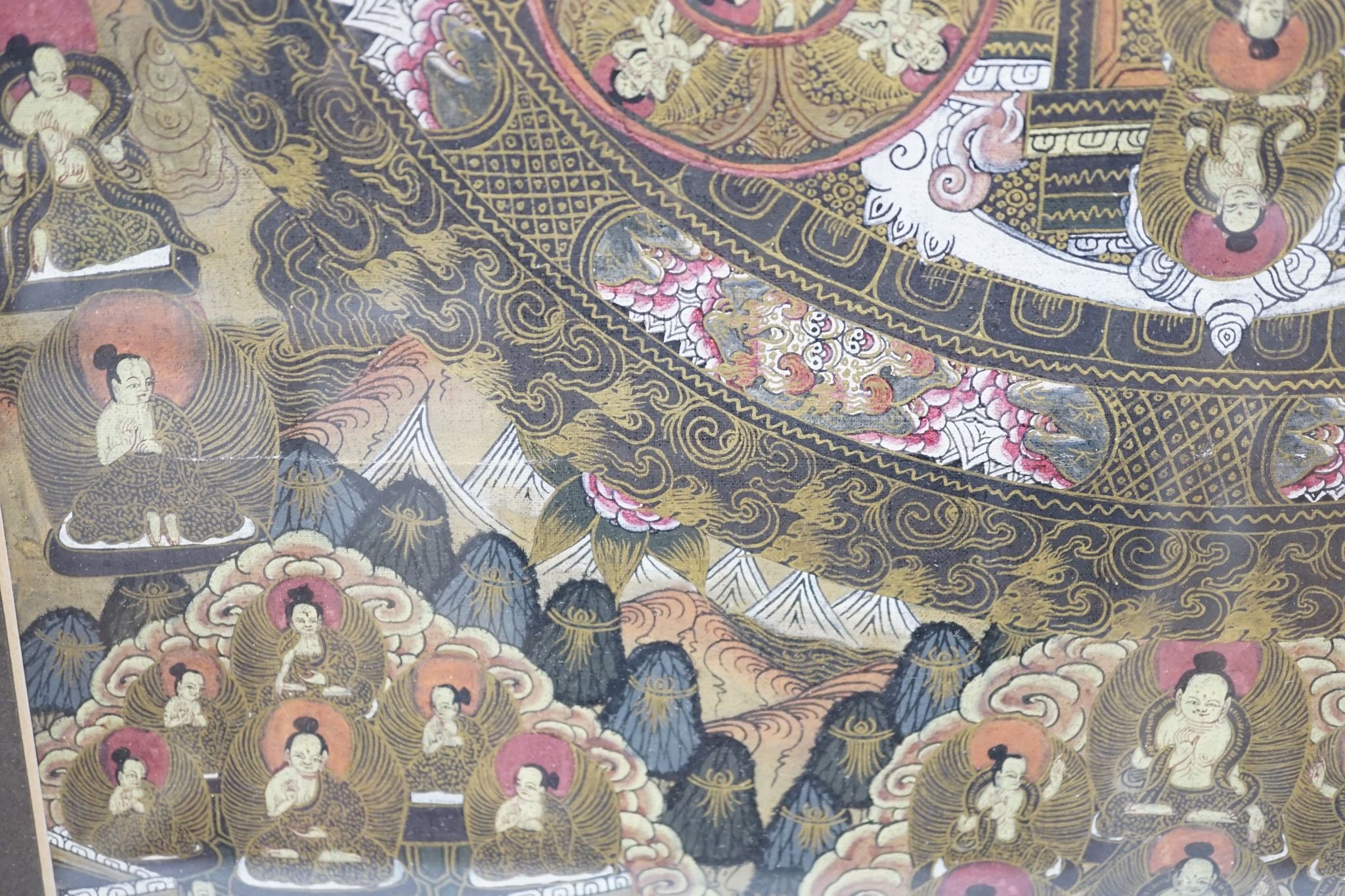 A painted thangka., 35 cms wide x 46 cms high.